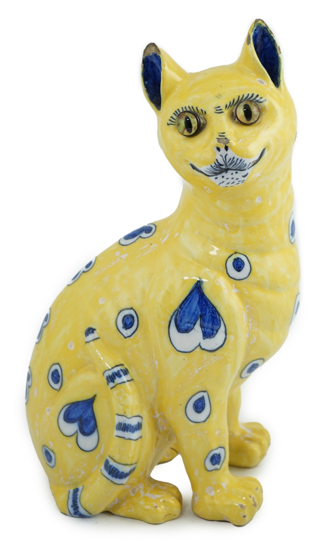 A Gallé yellow faience model of a seated smiling cat, c.1885